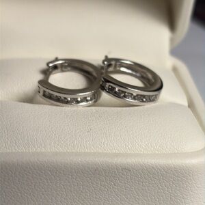 White gold and diamond huggie style earrings